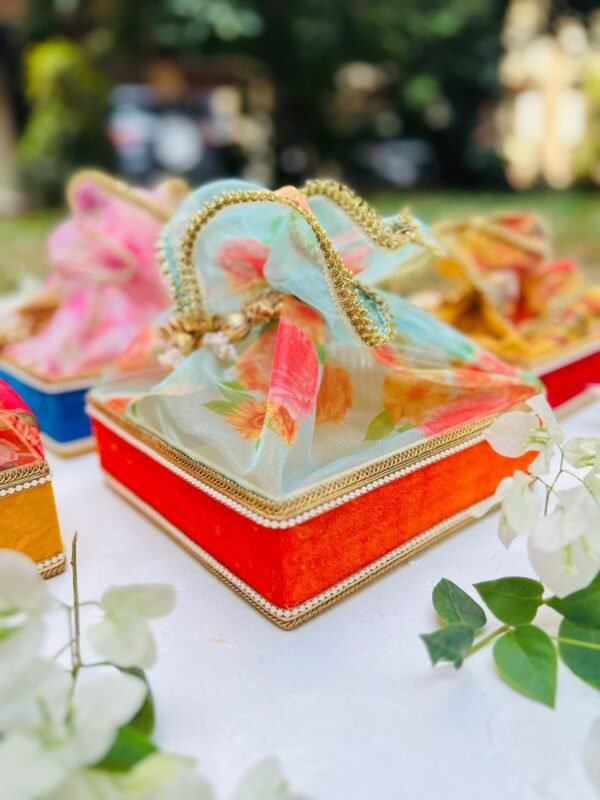 Floral Tissue Potli boxes combined with velvet